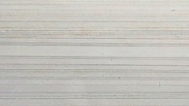 Kandla Lining Quartzite — Kandla Lining Quartzite is a premium silver-grey natural quartzite quarried in Rajasthan, featuring distinctive parallel linear graining and extreme surface hardness.